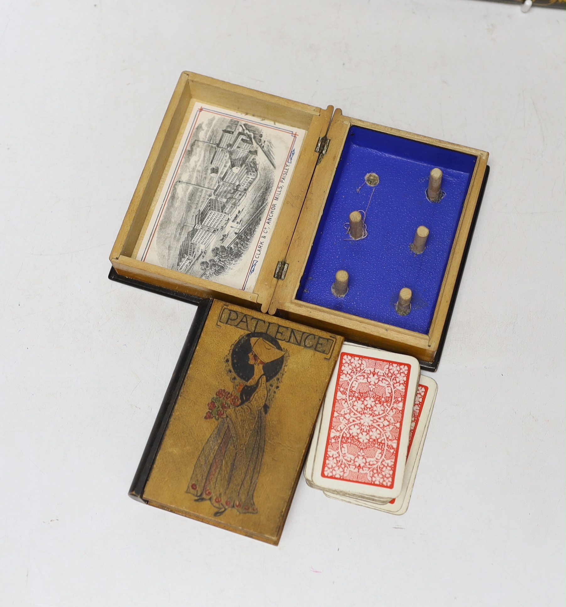 A Victorian papier maché blotter pad, and stationery box and two ebonised treen boxes